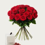 20 röda rosor med lakritskulor
